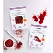 Krokos Kozanis Organic Greek Saffron Powder 0.5g box in a rustic Mediterranean kitchen, showing the authentic P.D.O. Red Gold filaments.