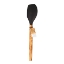 A handcrafted kitchen spatula featuring a natural olive wood handle with unique grain patterns and a matte black heat-resistant silicone head, shown against a white background with an "Olive Wood Collection" tag.